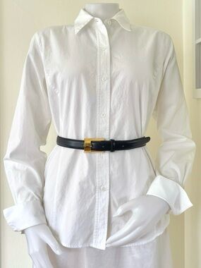 vintage dark navy blue leather skinny belt with gold tone buckle by Gail Labelle